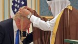Trump bows to the KSA.jpg