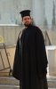 Greek Orthodox clergyman wearing clerical kalimavkion.jpg