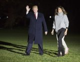 Melania-Trump-walks-with-President-Trump-in-grey-sweater-.jpg