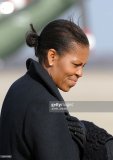 first-lady-michelle-obama-arrives-at-andrews-air-force-base-in-on-4-picture-id95574790.jpg